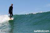 Robert August at Legends Surfing at UCSD Luau and Longboard Invitational at Scripps Pier by John Cocozza