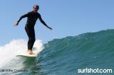 Robert August at Legends Surfing at UCSD Luau and Longboard Invitational at Scripps Pier by John Cocozza