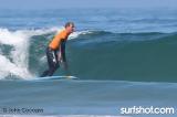 Robert August Surfing at UCSD Luau and Longboard Invitational at Scripps Pier by John Cocozza