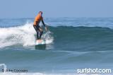 Robert August Surfing at UCSD Luau and Longboard Invitational at Scripps Pier by John Cocozza