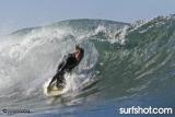 Jeff McCallum Riding Spoon Board at Big Rock Photo - John Cocozza