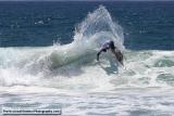 Surfer carving it up at the Pi Beta Phi Surf Classic